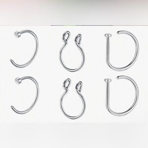 Faux piercing hoop set of 6. New. In original packaging.